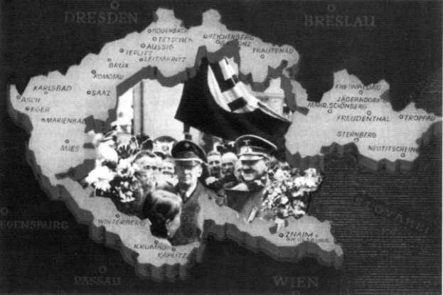 Schwarzes und weißes Foto einer Deutschlandkarte mit einer Gruppe von Menschen davor, einige halten Blumensträuße und eine Person hält eine Fahne, mit Text auf der Karte.