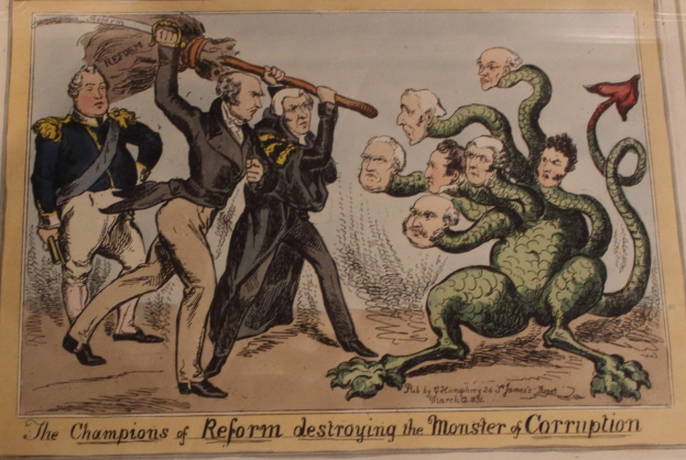 Cartoon-Illustration, die Reform-Vertreter bei der überwindung einer als 'Korruption' bezeichneten Personifikation zeigt, mit der überschrift 'Die Champions der Reform zerstören das Monster der Korruption.'