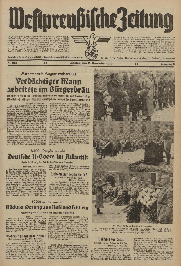 Schwarze-weiße Titelseite einer deutschen Zeitung vom 13. November 1939 mit der Überschrift "Weitpreubliche Zeitung", die eine Gruppe von Menschen in traditioneller deutscher Tracht in einer feierlichen Atmosphäre zeigt.